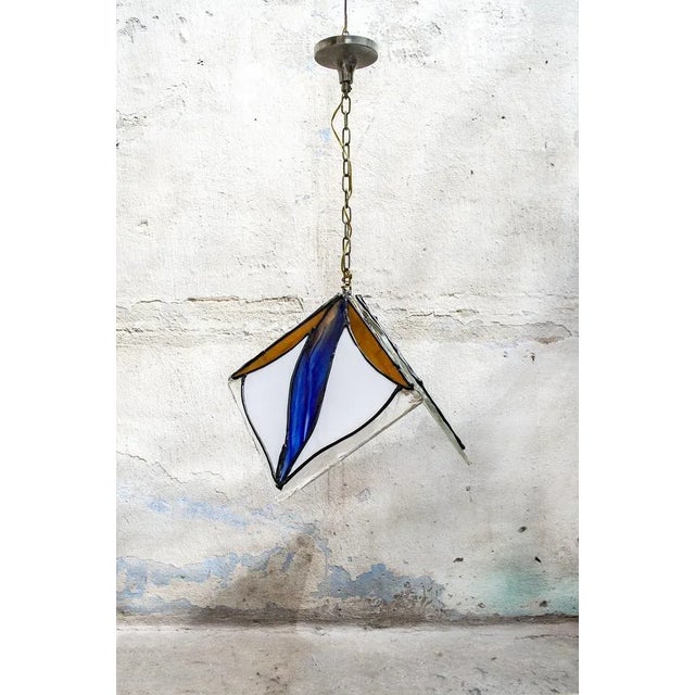 Colored lead glass pendant light and silicone decorations. Italian production 70s Up to 250V (Europe/UK Standard).The...