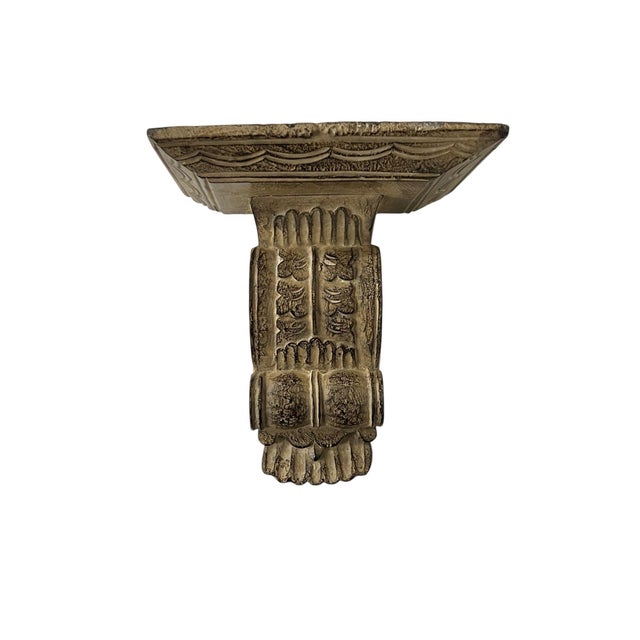 Vintage hand carved wood corbel wall display shelf. Cerused finish gives a look of age. Measures 7.5” w x 5.25” d x 8.5” h.