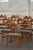 A beautiful and sculptural set of 10 oak dining chairs, designed by Henning (Henry) Kjærnulf for Nyrup Møbelfabrik in...