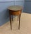 A very good Edwardian period inlaid mahogany oval shaped writing table. Decorated throughout with boxwood stringing and...