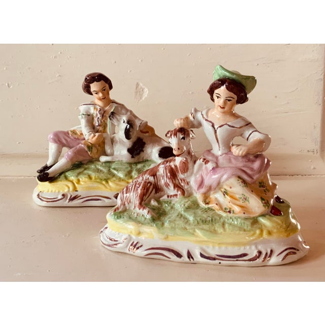 For your consideration... A charming and exceptionally well-preserved pair of early 20th century English Staffordshire...
