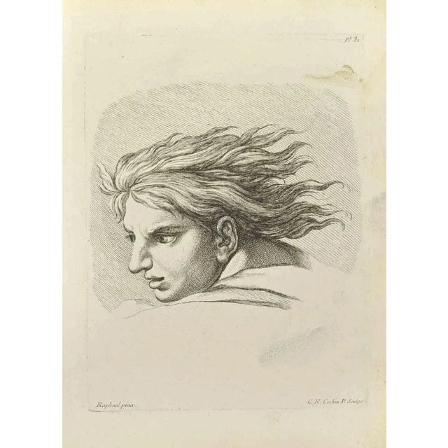 Portrait after Raphael is an etching realized by Nicholas Cochin in 1755. Signed on the plate. Good conditions. The...