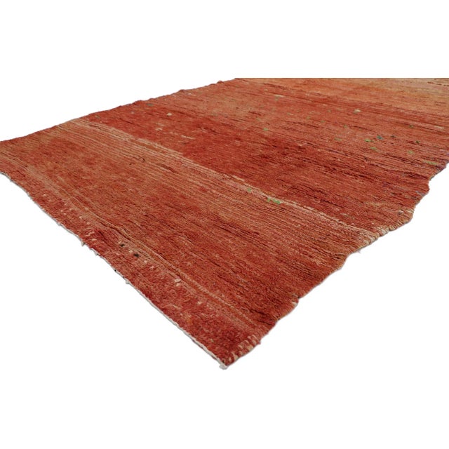 With its rustic sensibility, effortless beauty and simplicity, this hand knotted wool vintage Berber red Moroccan rug is a...
