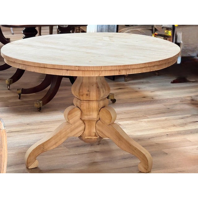 Biedermeier fruitwood tilt top round breakfast table, 19th c., circular top on turned pedestal and tripod base, 30"h x...