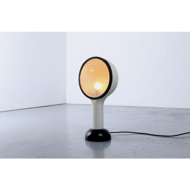 Italian ‘drive’ table lamp by adalberto dal lago for bieffeplast, 1974, white edition of 44 cm. a table lamp with an...