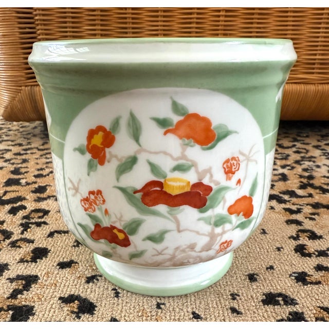 Hand painted porcelain Le Tallec cachepot made for Tiffany & Co. signed and numbered. Celadon green with poppies.