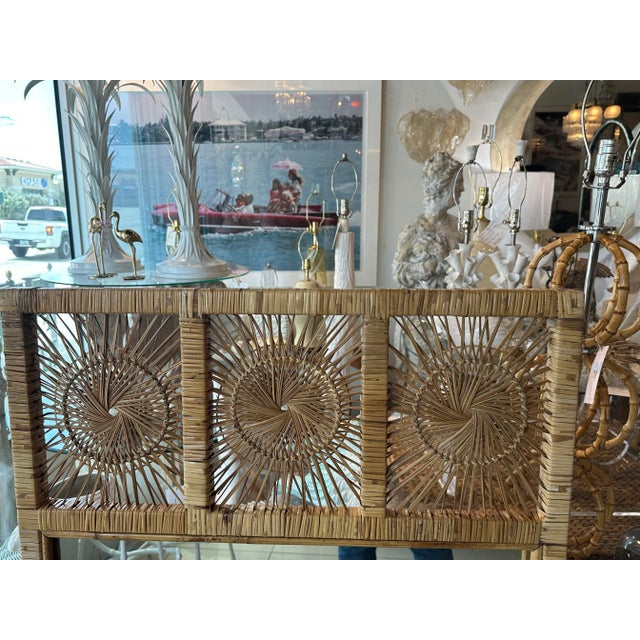 Vintage woven rattan, spun wicker wall mirror. Can be hung vertical or horizontal.. Dimensions: 50.25 H x 30 W x 1.5 D. No...