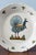 Diameter: 23 cm Height: 3.5 cm Slight wear throughout, commensurate with age. A glaze defect to the lip, otherwise very...