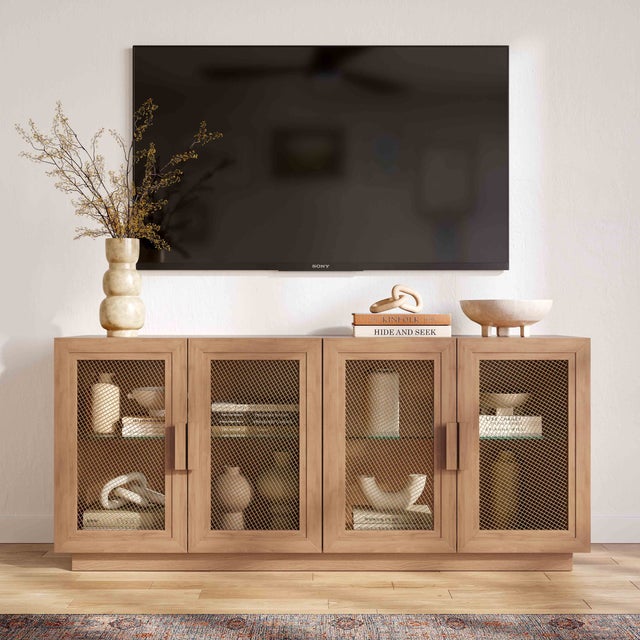 The Nolan Natural Wood Console is a stunning piece of furniture with a sleek, contemporary design featuring a natural wood...