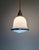 Bauhaus pendant light from the 1920s, featuring a white and blue opaline glass globe at the top and a blue frosted glass...