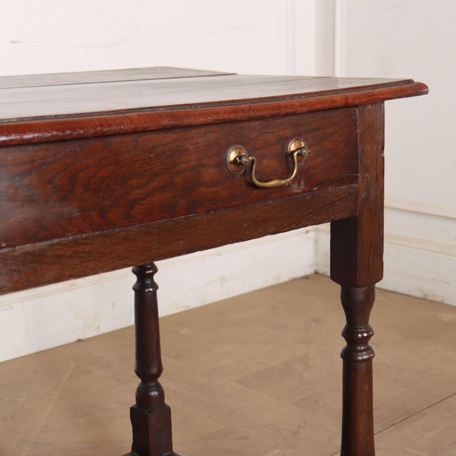 Late 18th century English one drawer oak lamp table. 1780. This piece is designed in the style of the selected designer...