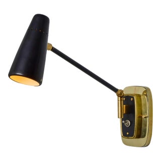 1950s Stilnovo Perforated Black Metal and Brass Sconce With Stamped Label For Sale