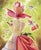 This oil on canvas artwork features a whimsical fusion of fashion and nature, depicting a dress form adorned with vibrant...