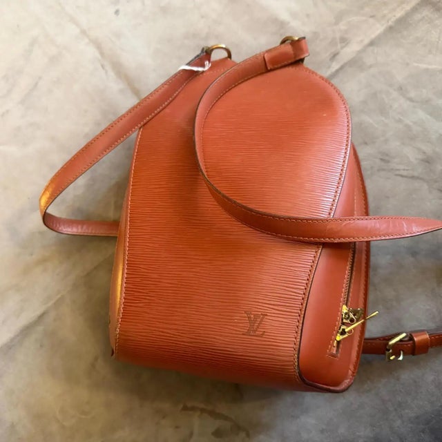 This elegant Louis Vuitton Mabillon backpack is a timeless accessory that combines utility with high-fashion minimalism....