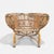 Franco Albini Italian Pencil Reed Rattan Chair Showcaseing a masterful use of organic materials, with sweeping, sculptural...