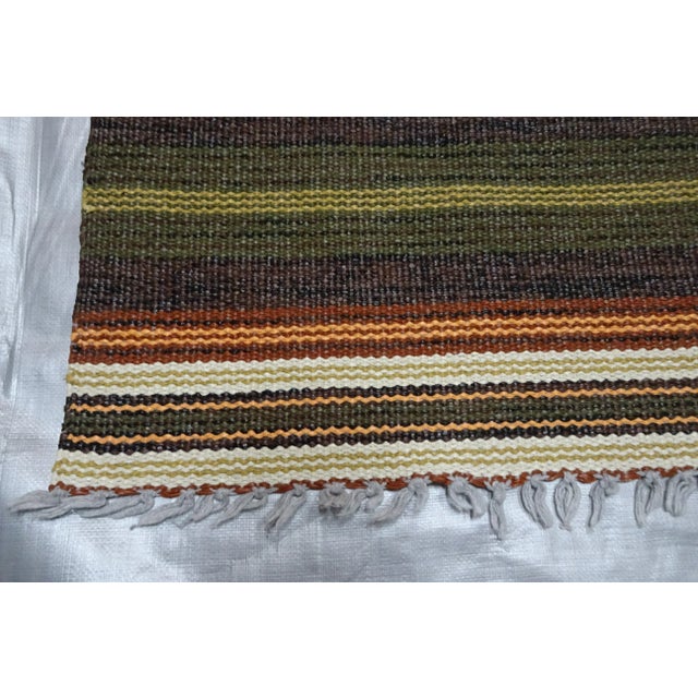 A hand made Swedish rag rug found at a state auction in Dalarna Sweden.