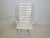 Adjustable "Riviera" lounger/garden chair by Triconfort with a wooden frame in a simple, minimalist design. The backrest...