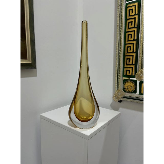 The Goccia design is a very popular classic vase hand made at the Murano Glass Furnaces of Robert Beltrami, former Master...