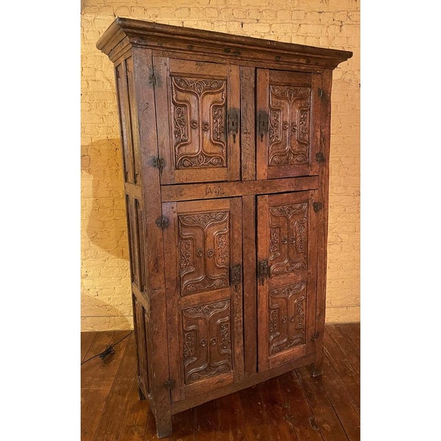 Exceptional and very rare Gothic 4-doors buffet or wardrobe in oak, 15th century period from the north of France This rare...