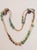 Here's a finely beaded necklace circa 1980s that features chunky turquoise and jasper beads with hand braided cord and...