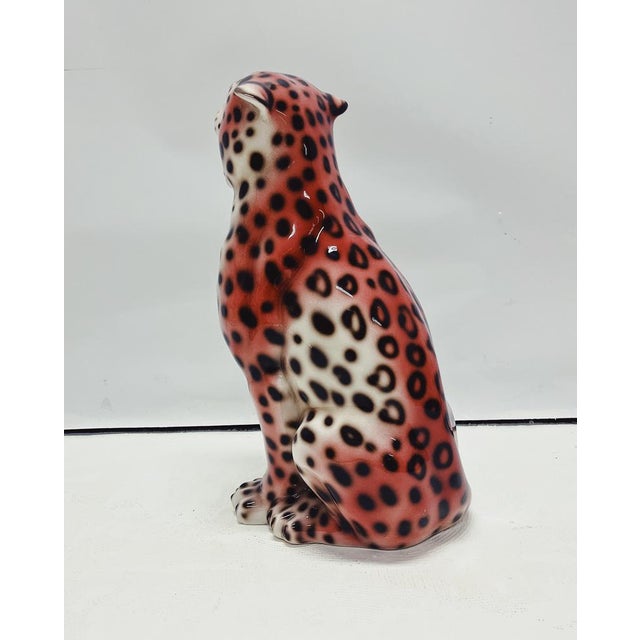 Unique handmade sculpture of a pink panther. This Hollywood Regency piece, crafted from hand-painted ceramic and made in...