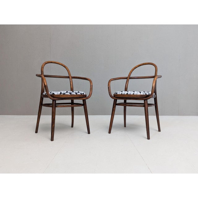 An exceptionally rare pair of bentwood armchairs designed by Czech architect Radomír Hofman for the Czechoslovak Pavilion...