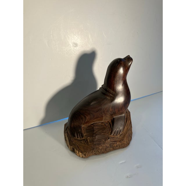 This hand carved seal is carved in iron wood ( Linum vitae) This wood is the most dense wood in the world