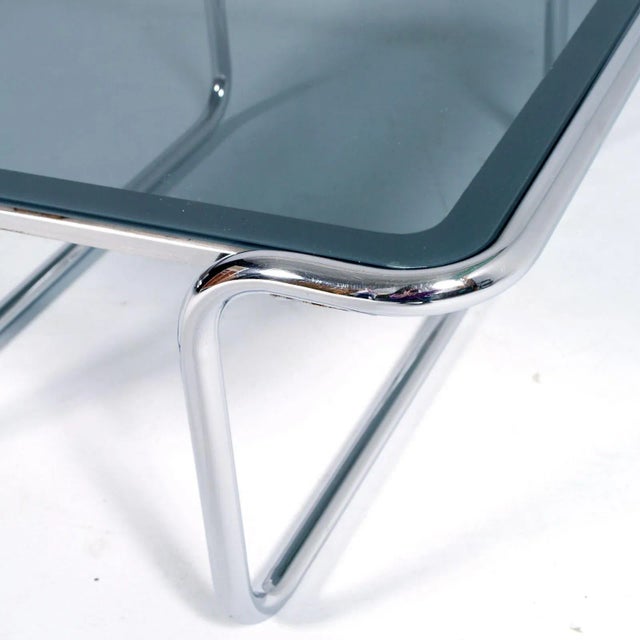 - Italian mid-century cocktail table - Designed by Giotto Stoppino - Made of tubular chrome and glass - With edging...