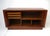 A very well-crafted teak wood credenza with unique double tambor doors having long nicely shaped handles. Inside there are...