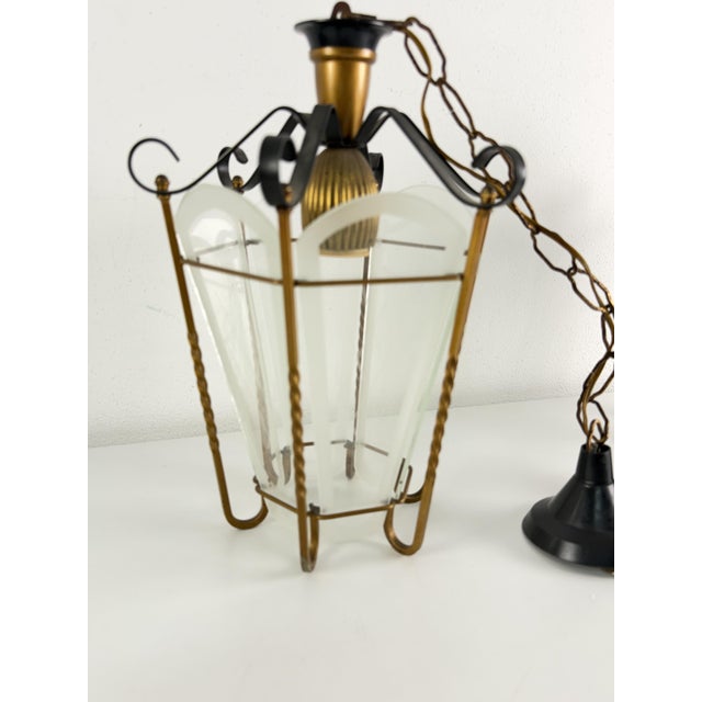 Set of two brass and Murano glass pendant lamps, 1950s Intact and in good condition, E27 bulbs. Diameter 25 cm Height of...