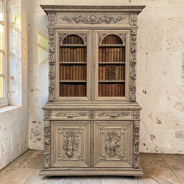 Richly sculptural and unmistakably French, this magnificent 19th century Renaissance Revival Hunt bookcase is a superb...
