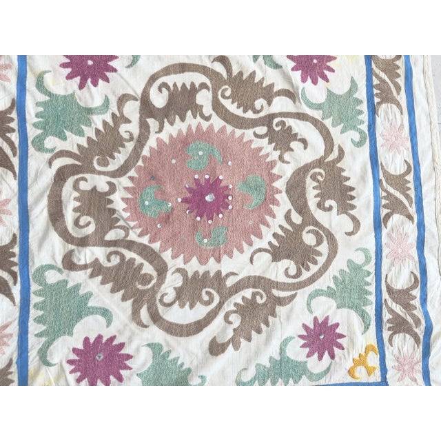 Boho Vintage Suzani from Uzbekistan, circa late 1960s. There are stains on this suzani. Dimension; 46'' x 50'' inches /...