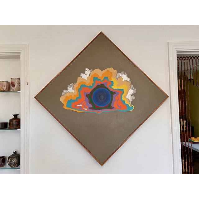 This large framed vintage artwork features a psychedelic, abstract swirling cloud-like formation resembling an eye, or a...