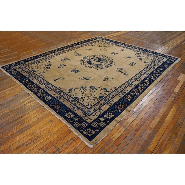 Antique Chinese - Peking Ivory 1900s Rug, Circa Date: 1900s. This exceptional Chinese Peking carpet exemplifies the...