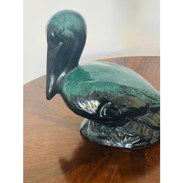 Polychrome ceramic sculpture of Pelican.