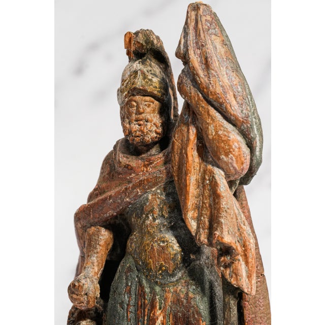 Rich with old-world character and centuries of history, this captivating 18th-century Continental carved wood sculpture...
