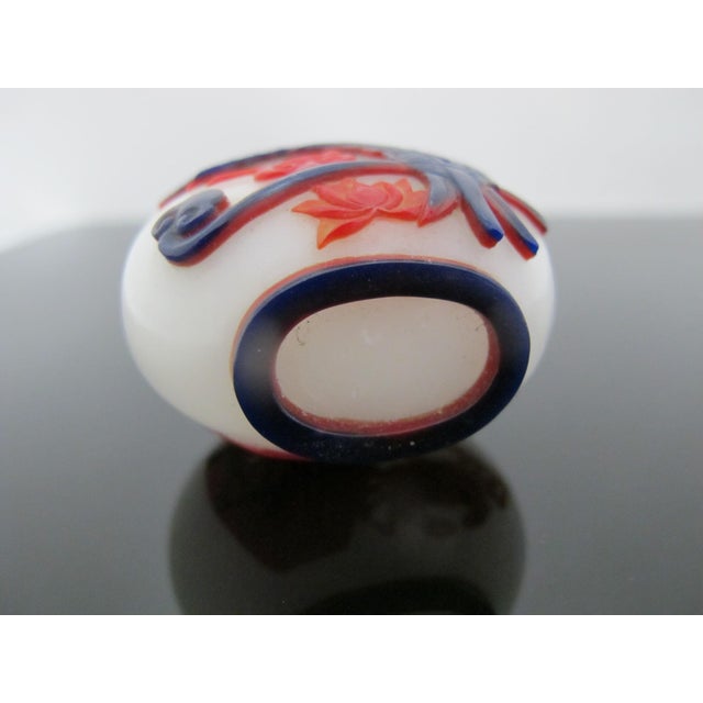 Red Chinese Ruyi Crab Lotus Carved Overlay Red & Blue Peking Glass Snuff Bottle For Sale - Image 8 of 11