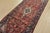 An authentic semi-antique traditional Malayer runner hand-knotted with fine wool and natural dyes. This oriental rug...