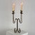 Introducing an elegant Italian four-arm candelabrum in silverplate from the 1930s. This exquisite piece features an...