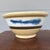 Antique English Yellowware Mixing Bowl with Blue Seaweed Decoration, Circa 1840s A visually striking and decoratively...