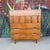 Mid-Century Modern American of Martinsville Walnut Chest. Features five drawers with iconic geometric inlay.
