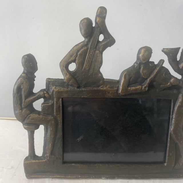 Frame size: is 3.5” x 5.5”. Great gift for the music lover. Has a sculptural modern brutalist look to the design