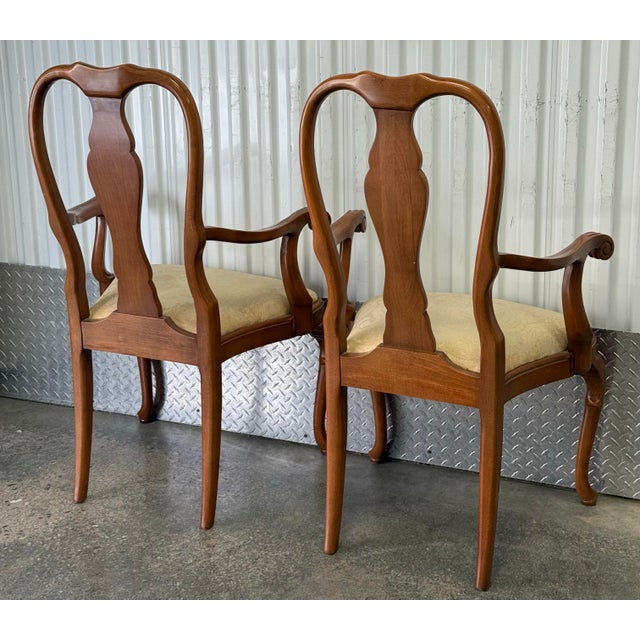 Lovely pair of Queen Anne armchairs by Buying and design.Features classic design elements including elegant cabriole legs...