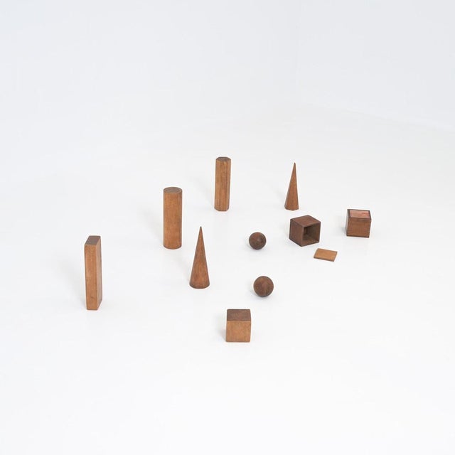 This nice set of 10 wooden geometric models are original of the 1940s. They used to help artists and students render...