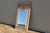 Beautiful vintage Italian hand-carved wood trumeau mirror, dating to the 1950s. This substantial statement mirror features...