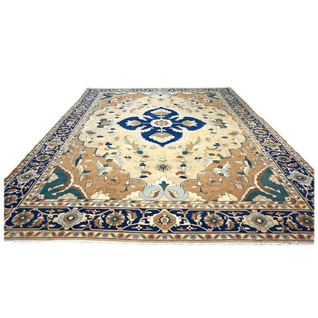 Condition: New Origin: Persia Design: Heriz Actual size: 11'10" x 14'6" Thickness: 1/2" Color: Tan, Brown, Navy, Blue,...
