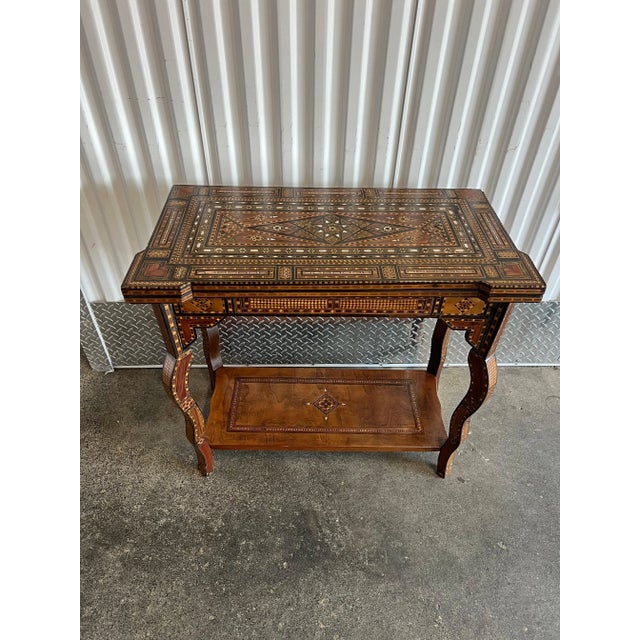 Antique Inlaid Syrian Gaming Table sold as found in vintage condition showing normal signs of wear for its age such as...