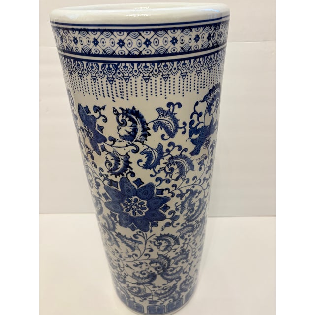 This vintage Chinoiserie umbrella stand stands at 23" high made of high-quality, durable fine Chinese porcelain. It...