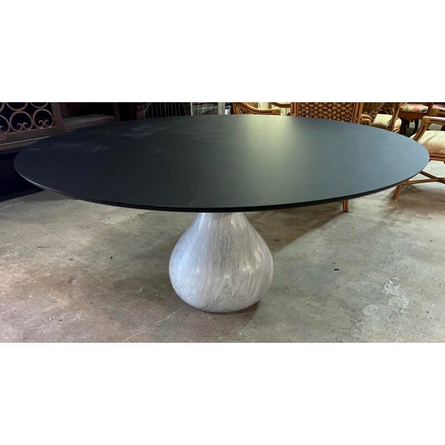 An incredible vintage Contemporary dining table. Made by the iconic Roche Bobois group. Beautiful matte Carrera marble...