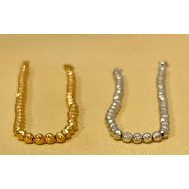 very fashionable , Beaded bracelet Pair of 18 Karat White Gold/ Rose Gold Ball Bracelets, 8.2 Gm, Length 7.5 Inch Two...